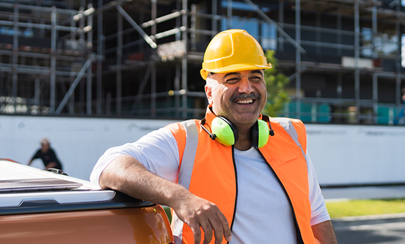 Smiling construction man in hard hat